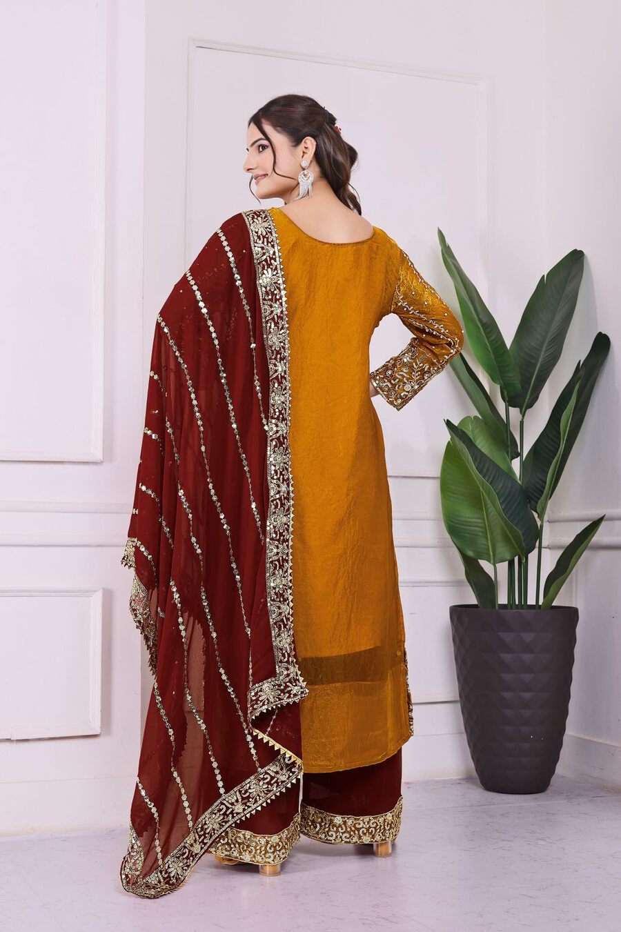 RICH LOOK FENDI SILK EMBROIDERY AND SEQUENCE WORK WITH RIVET MOTI WORK TOP PALAZZO WITH DUPATTA